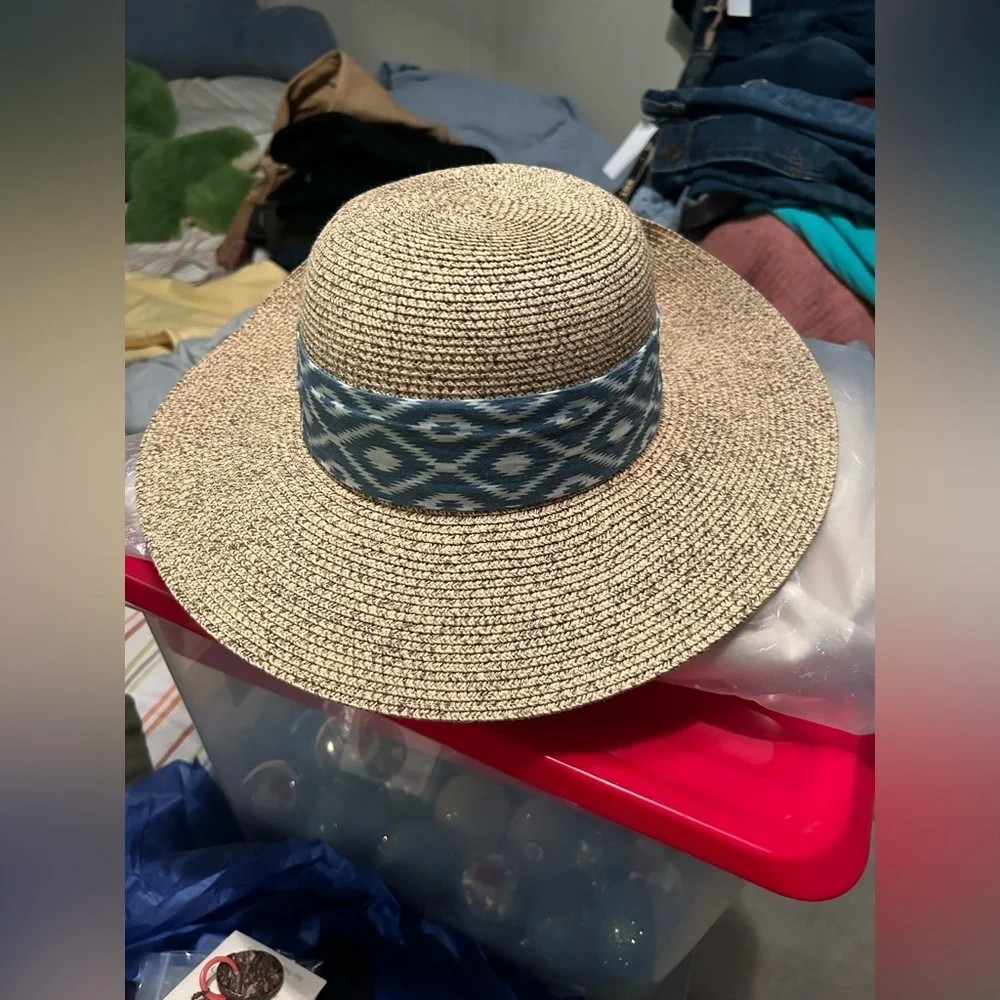 Brand: Sun n’ Sand Size: One size Color: Brown with blue and white bow